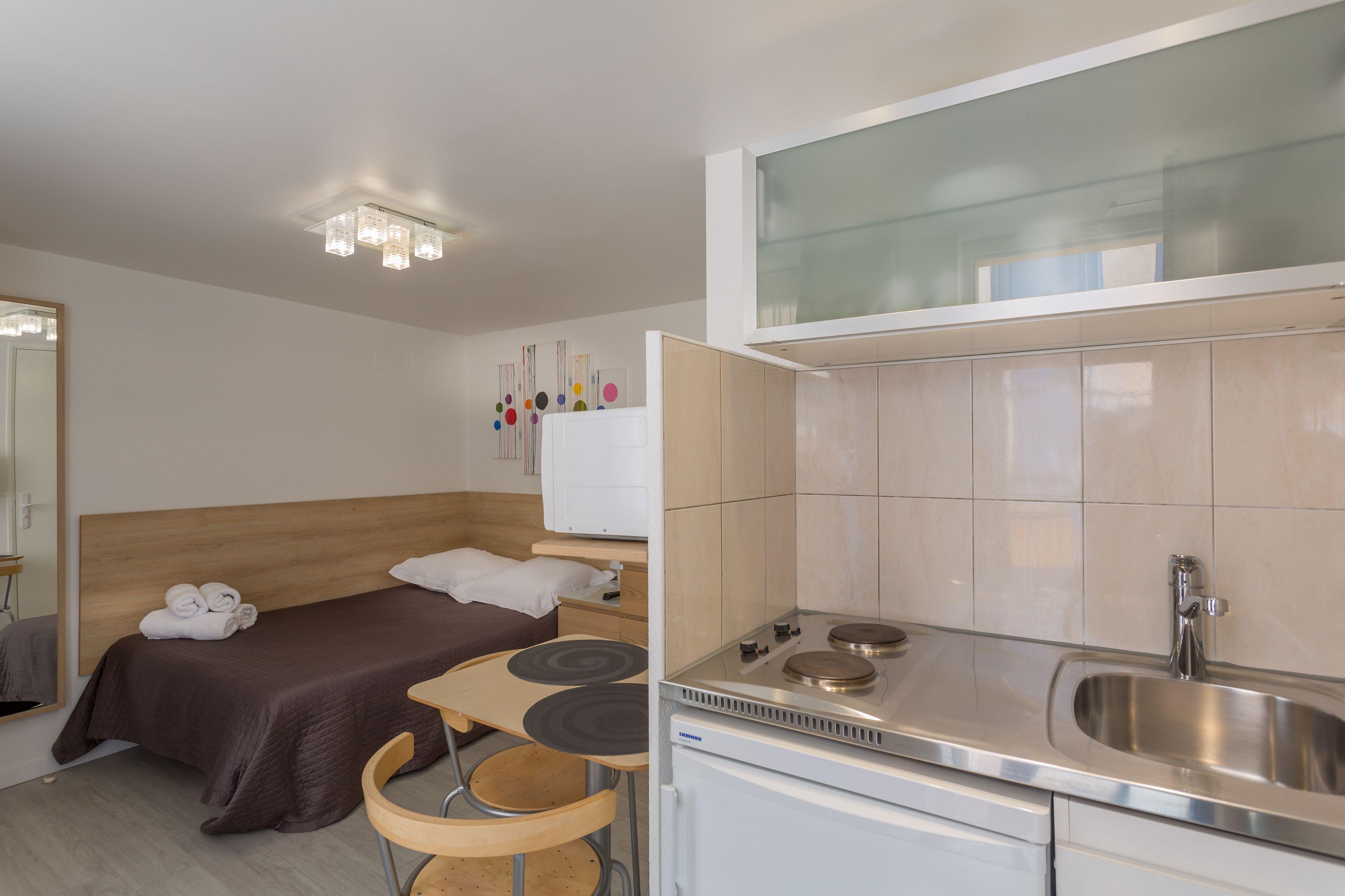 De L'horloge Aparthotel